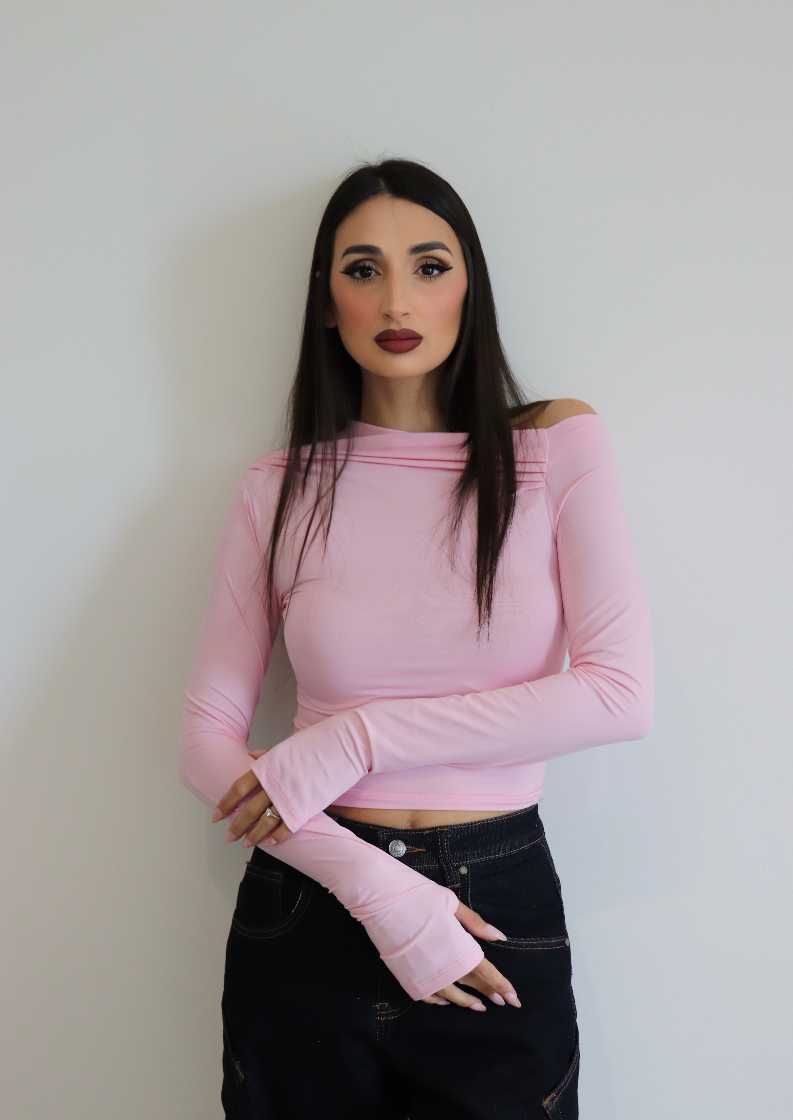 Maglia in licra con scollo asimmetrico