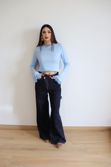 Jeans wide leg con chiusura asimmetrica