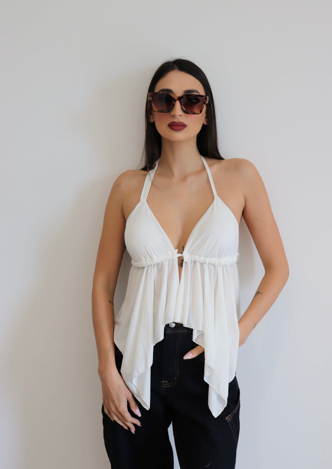 Top scollato