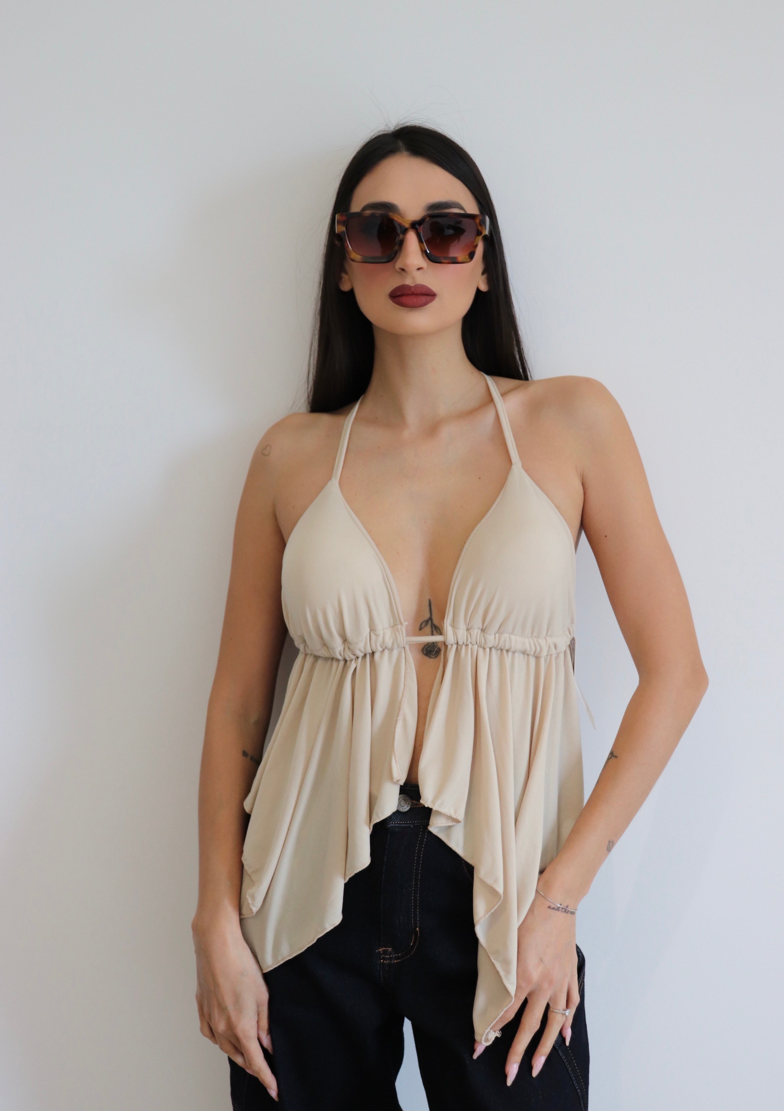 Top scollato