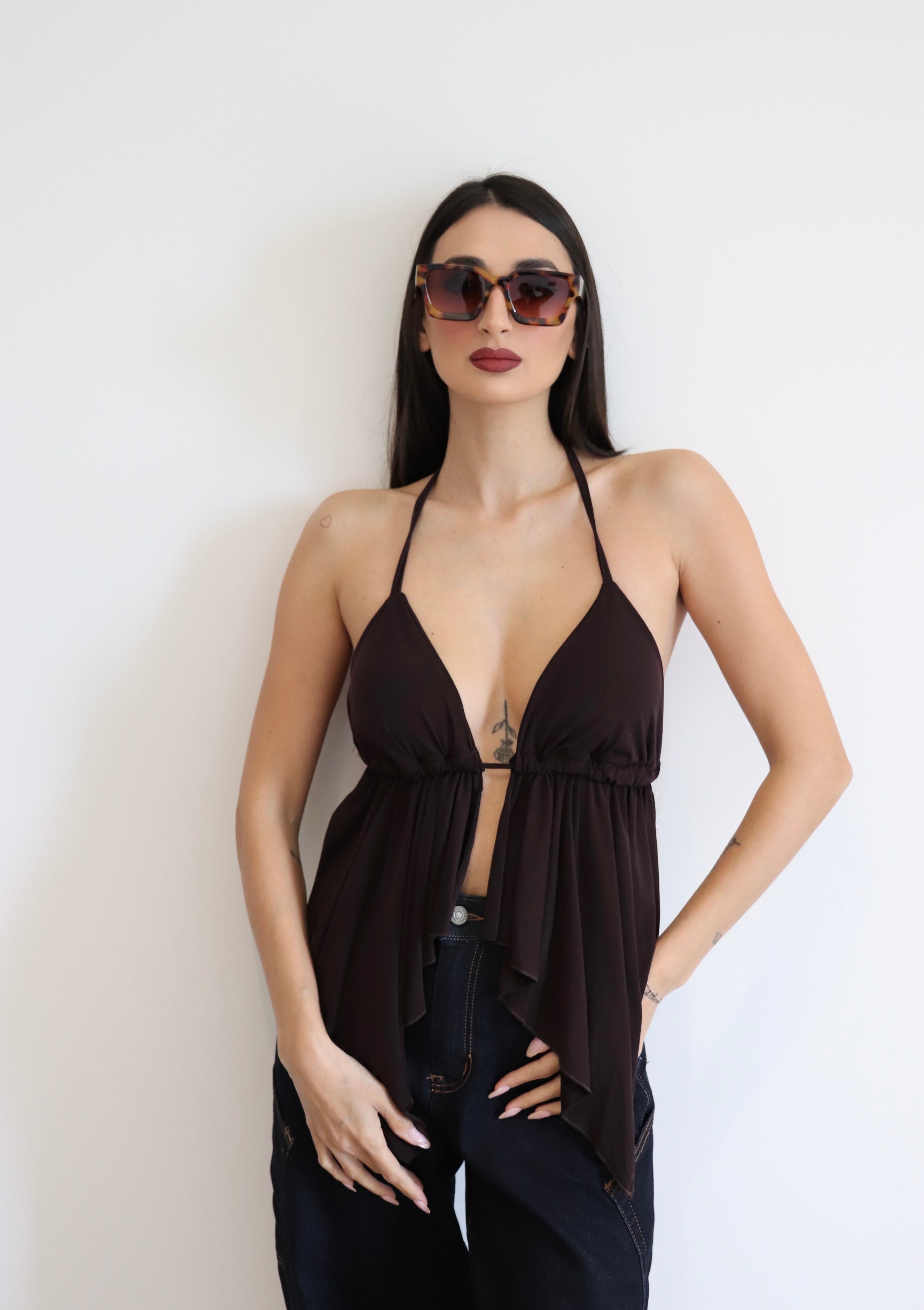 Top scollato