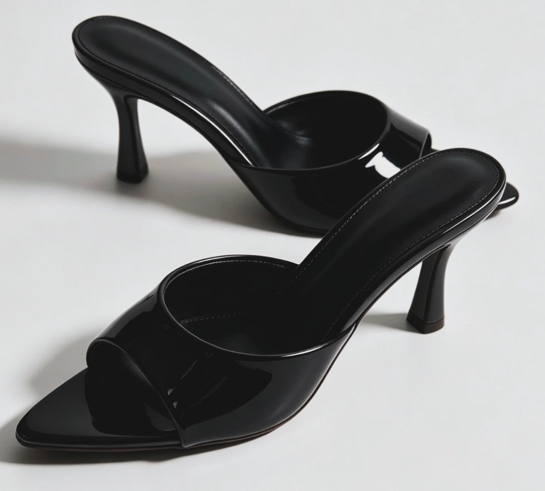 Mules con tacco lucide